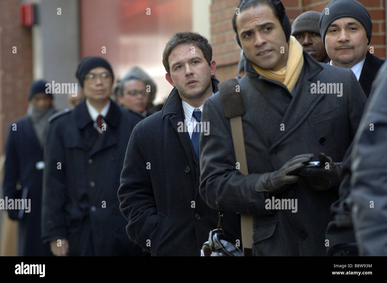 Hundreds of people line up in New York for a job fair sponsored by