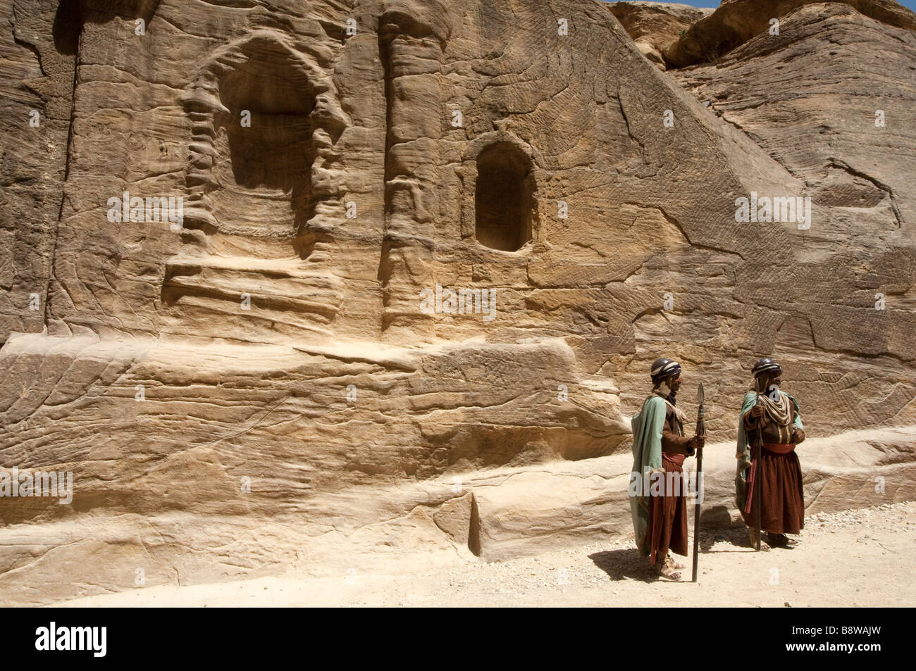 Two guards in the entrance to Petra Jordan Stock Photo