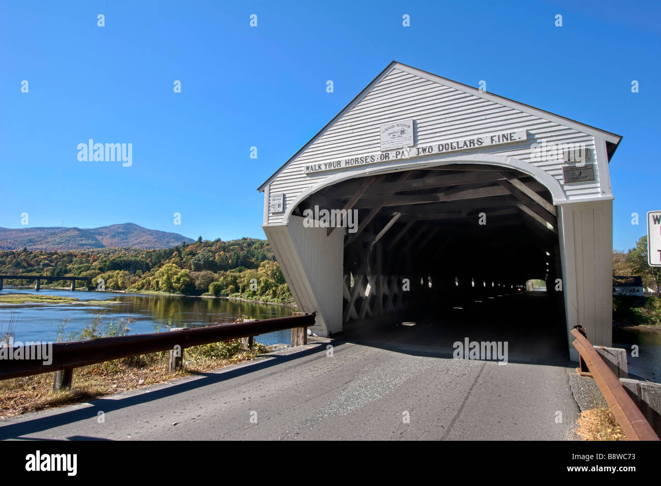 The Cornish Windsor Bridge is the longest wooden covered bridge in the United States. Stock Photo