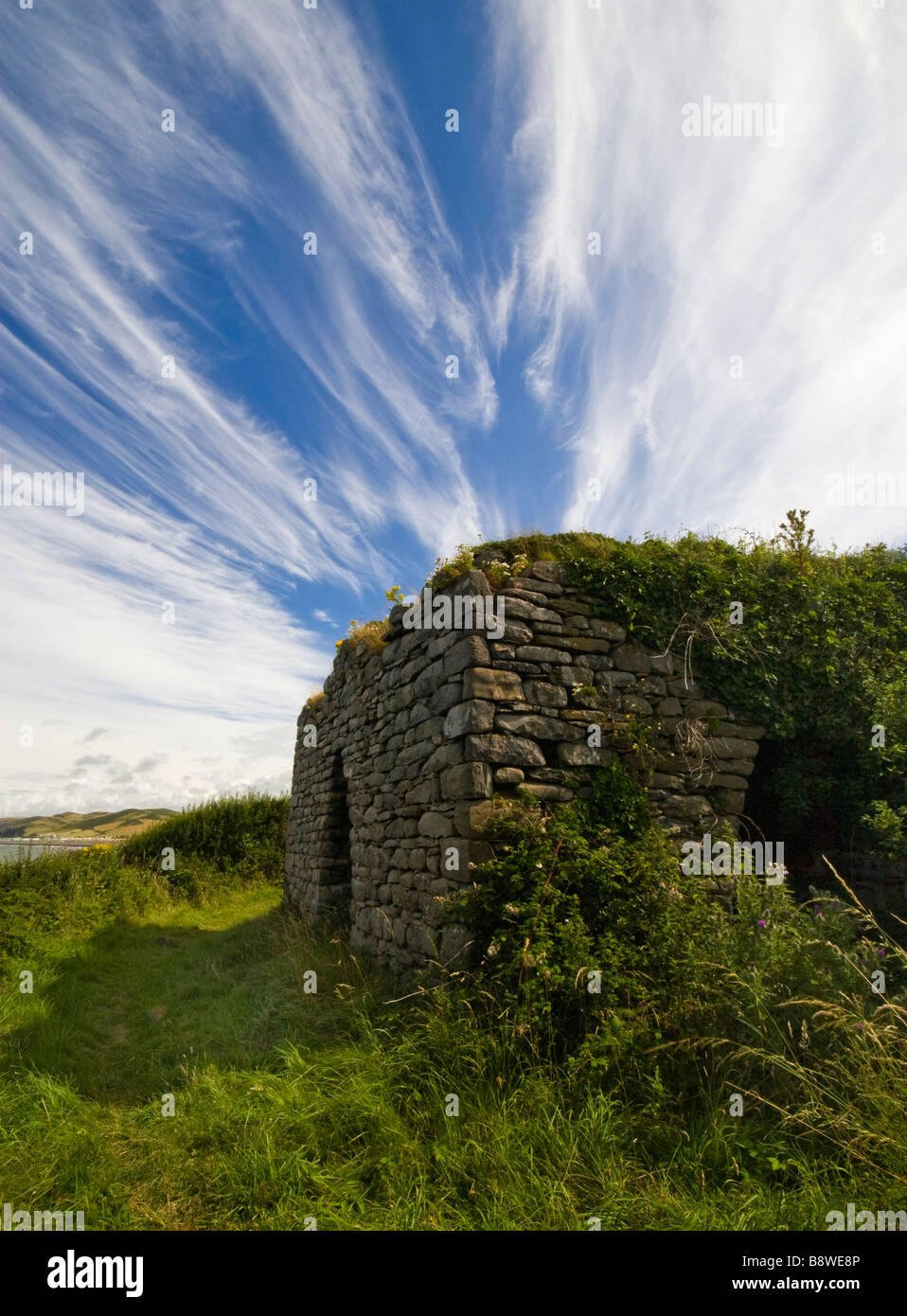 Remains of Lime Kiln ovens near Llanrhystud Ceredigion coastal path West Wales UK Stock Photo