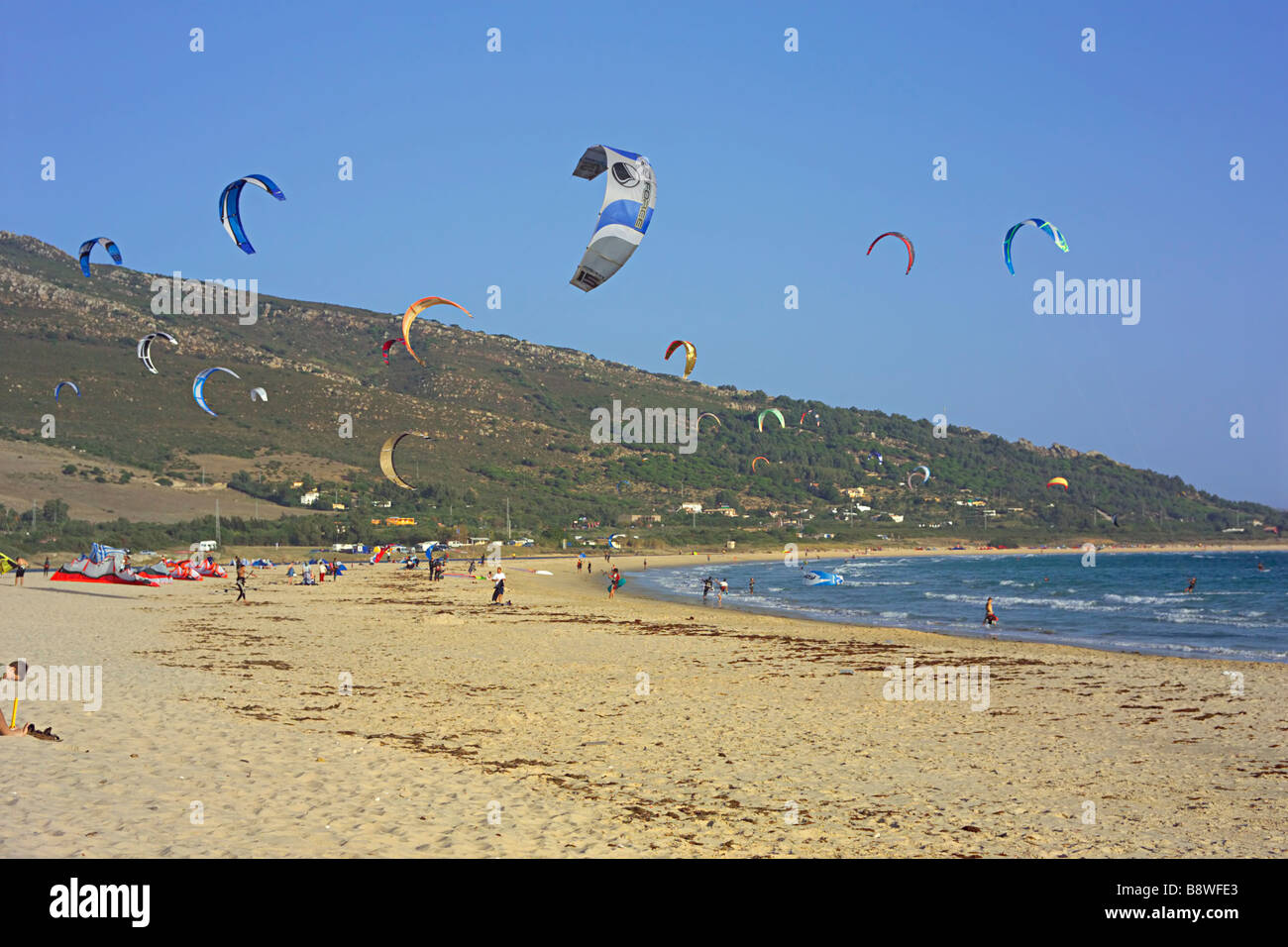 kite surfers launching kites on the beach at Tariffa, southern Spain