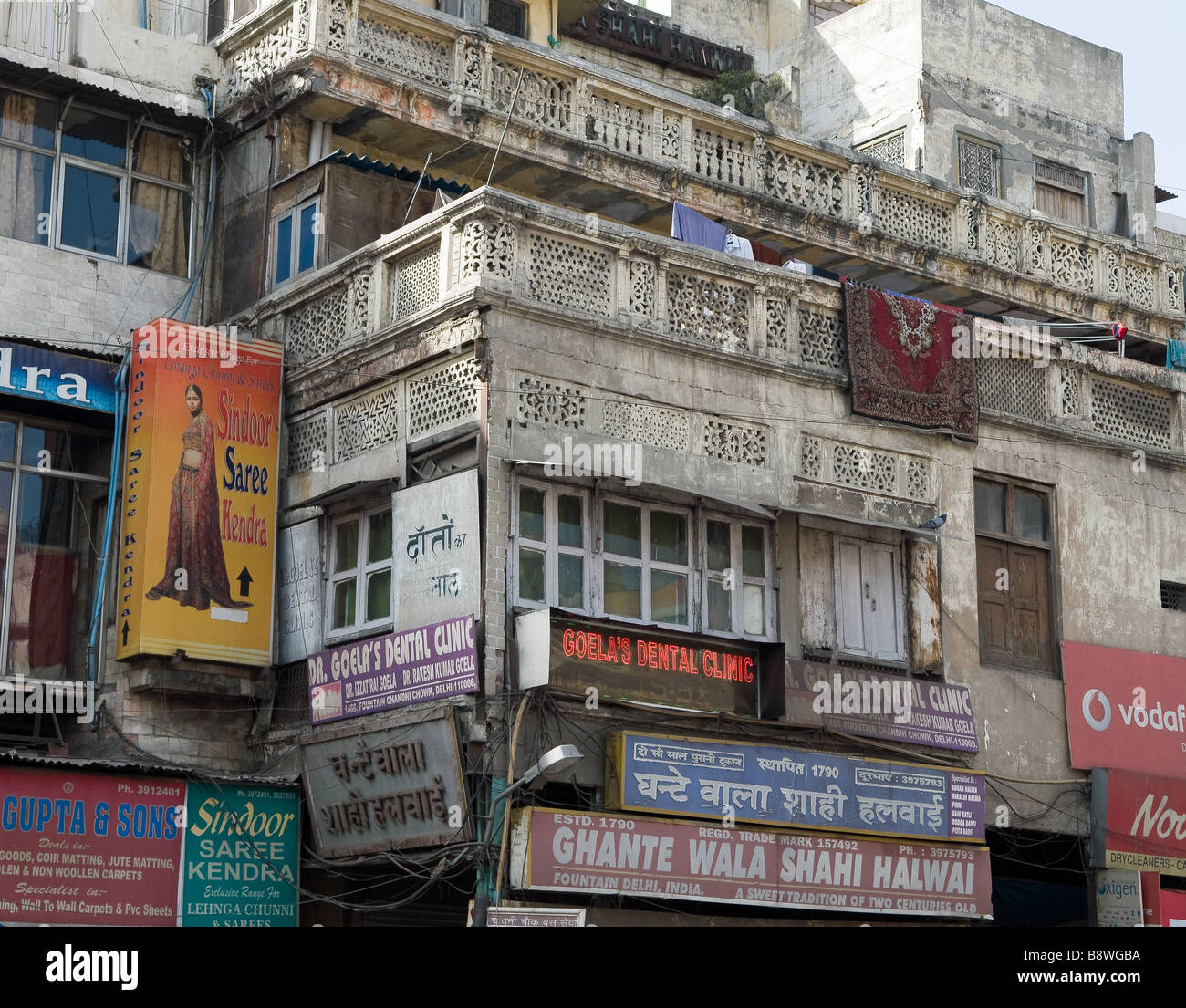Buildings facing Old Delhi main street Stock Photo Alamy