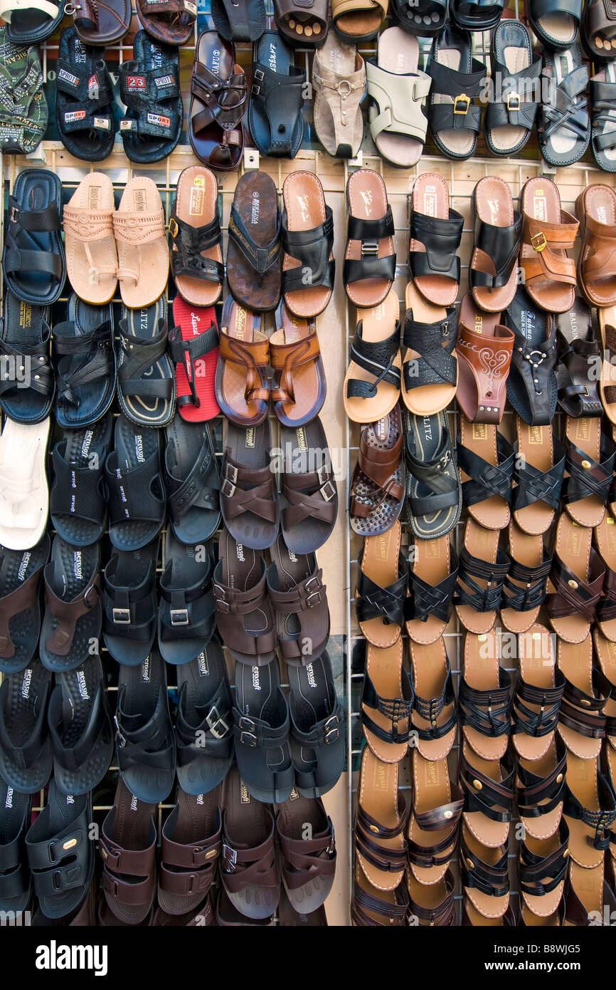 Seller of slippers Deira Dubai United Arab Emirates Stock Photo Alamy