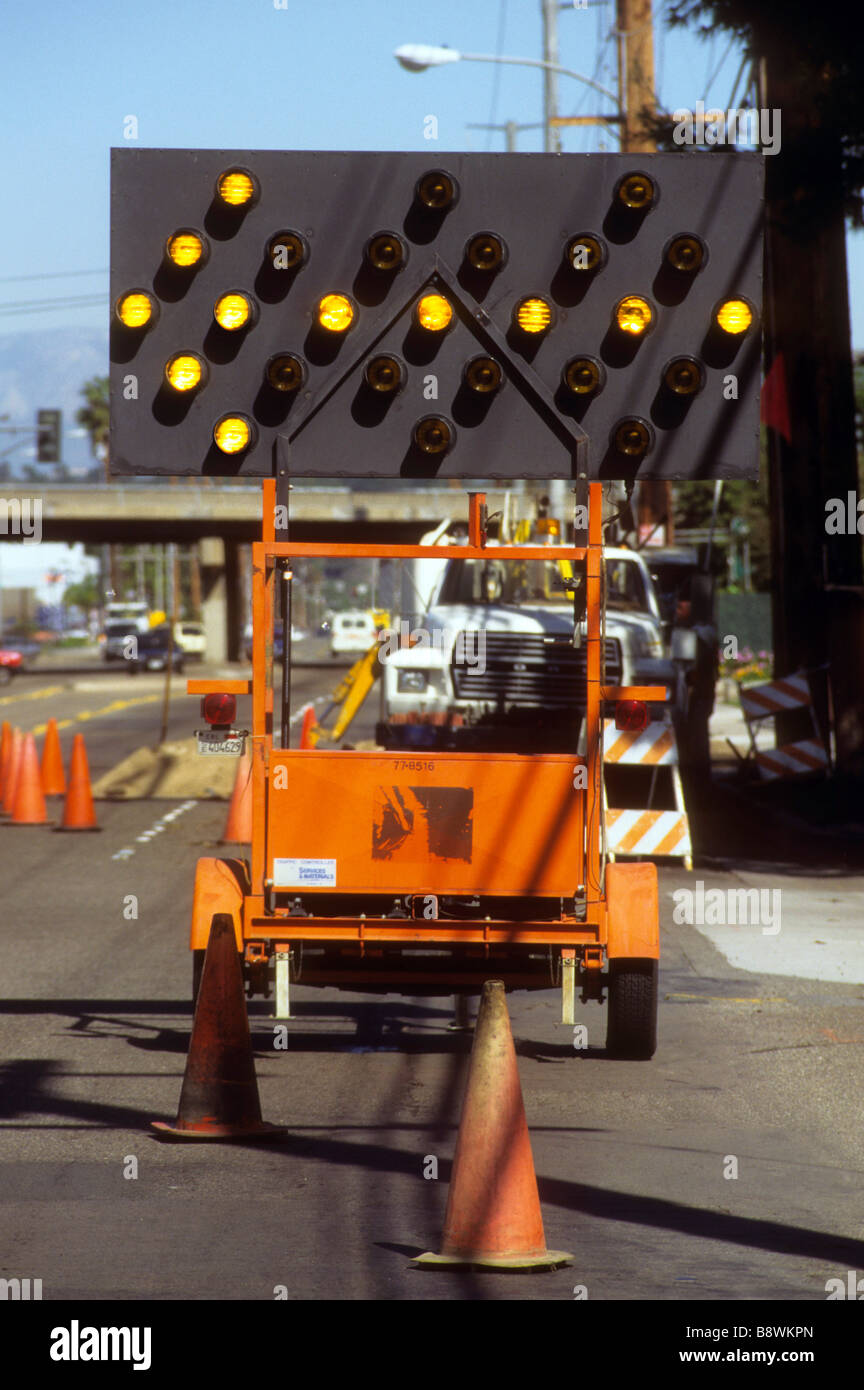 lane close closure arrow sign alert warn caution direction signal