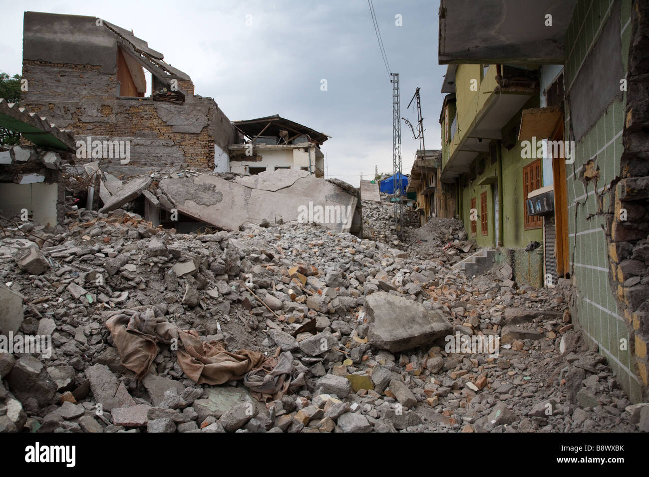 Ruins of buildings in a street in central Muzaffarabad, Pakistan destroyed in the October 2005 Kashmir earthquake Stock Photo