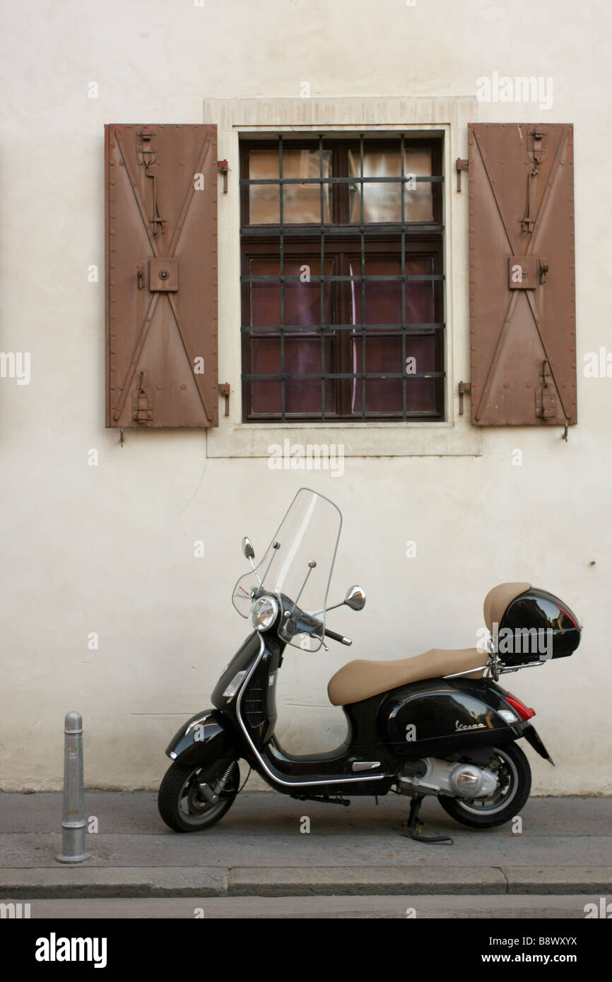 A scooter rests outside a window in Zagreb Croatia Stock Photo Alamy