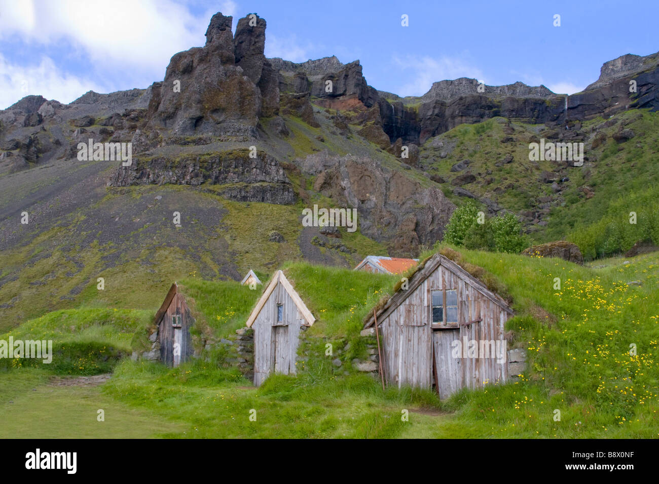 Old traditional turf farms at hillside, Iceland Stock Photo