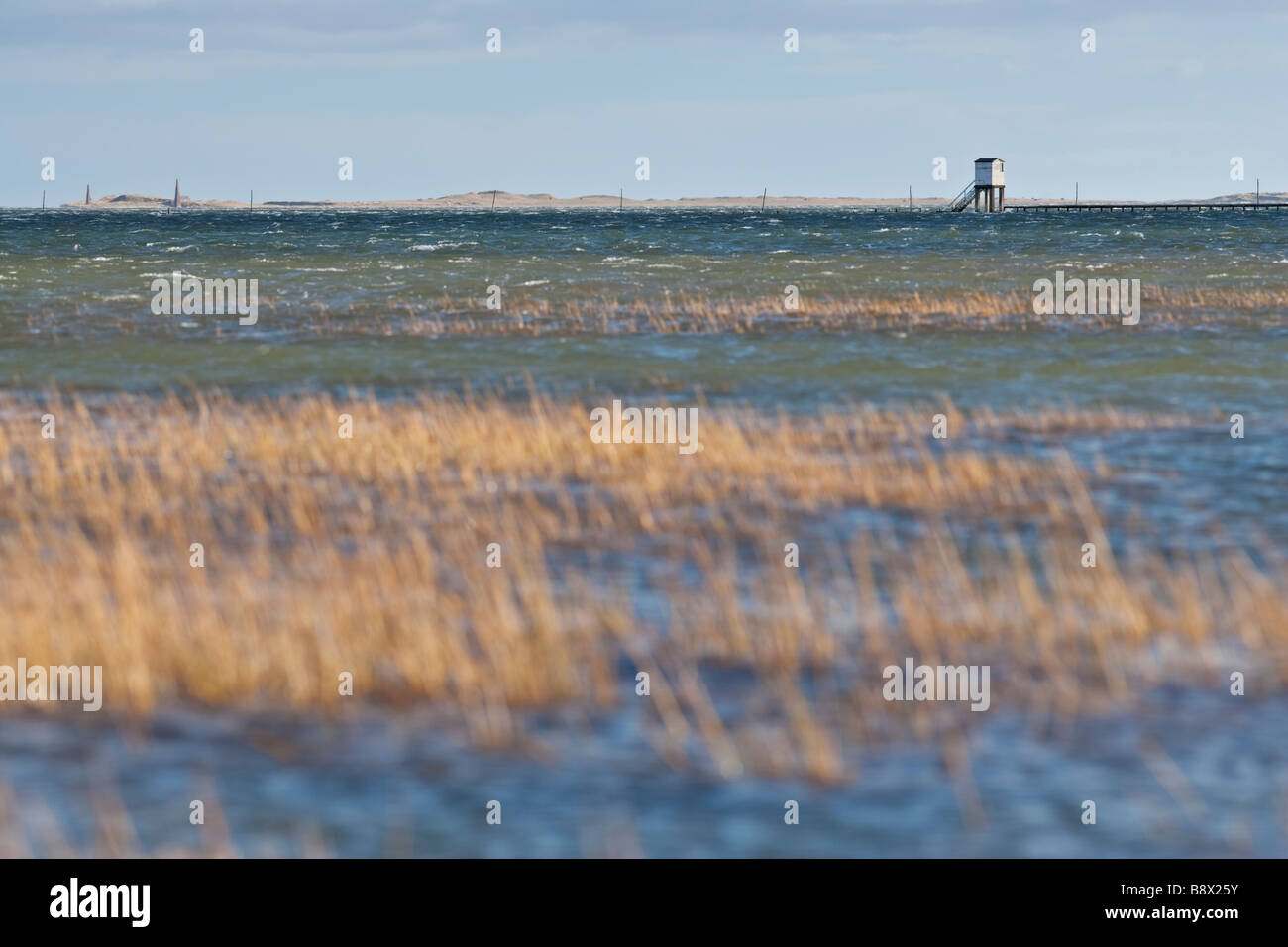 The water covered causeway across to Lindisfarne Holy Island at high tide, Northumberland, England Stock Photo