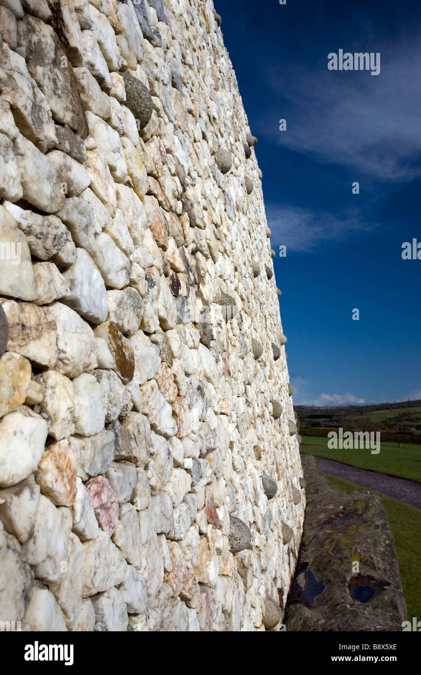 The reconstructed quartzite outer wall at Newgrange County Meath Ireland Stock Photo