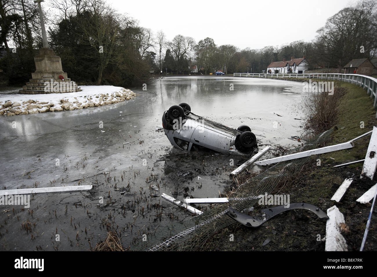 car crash in frozen pond UK Stock Photo Alamy