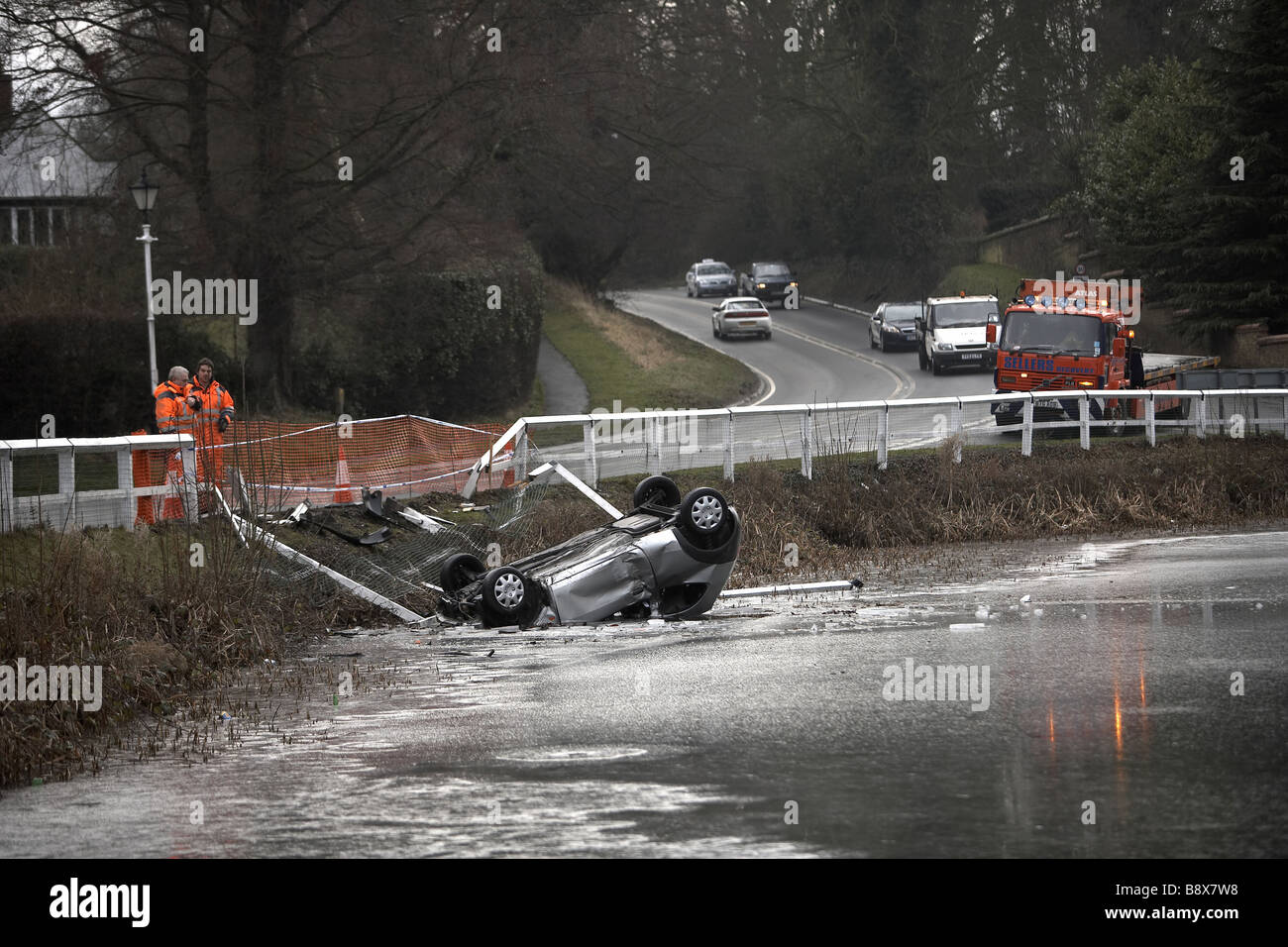 car crash in frozen pond UK Stock Photo Alamy