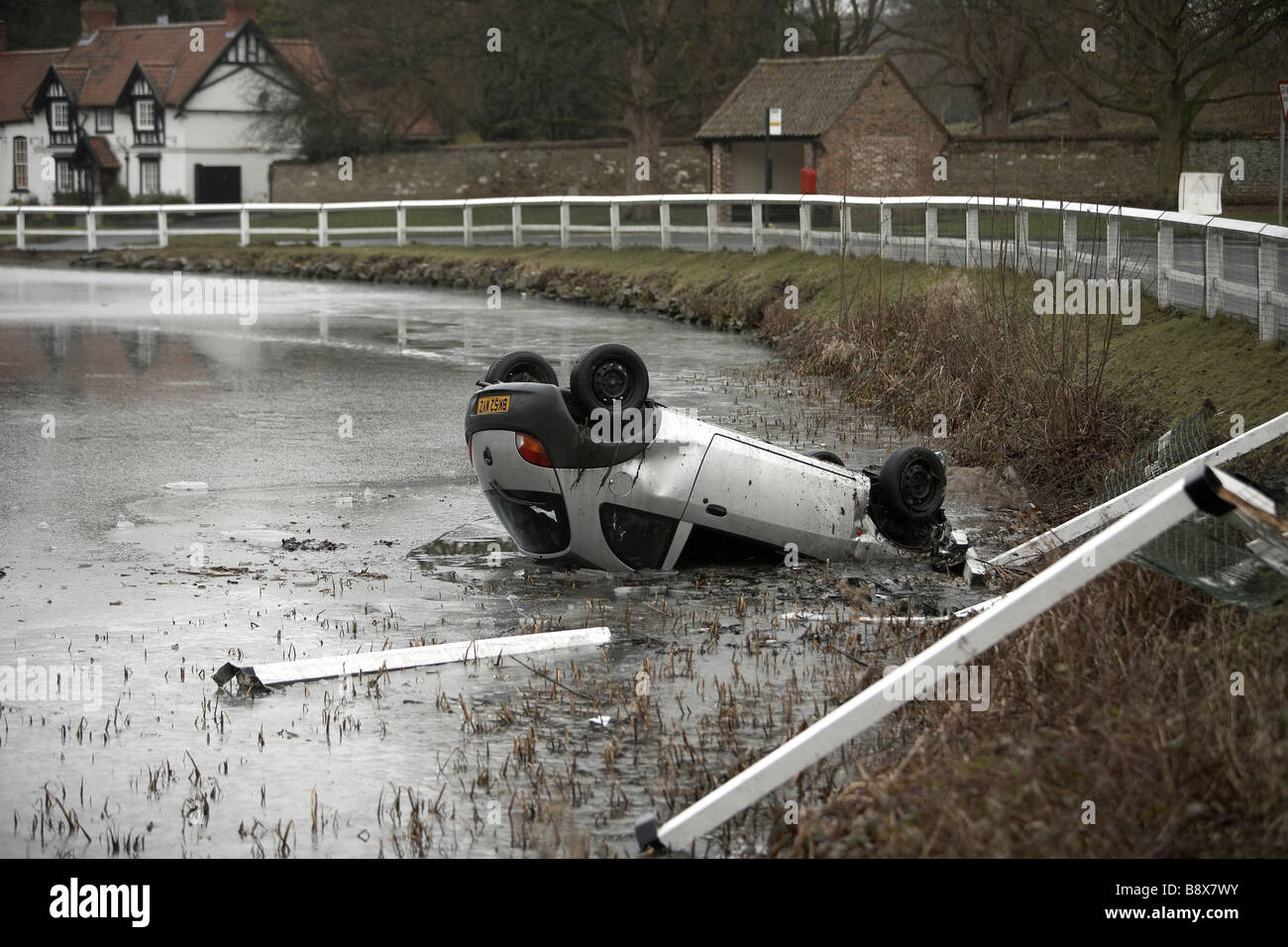 car crash in frozen pond UK Stock Photo Alamy