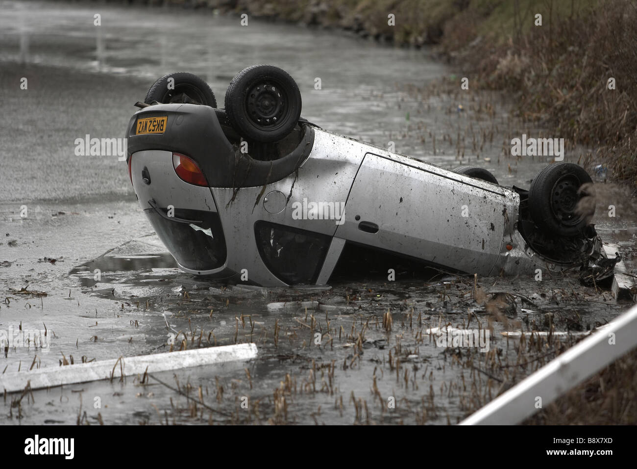 car crash in frozen pond UK Stock Photo Alamy