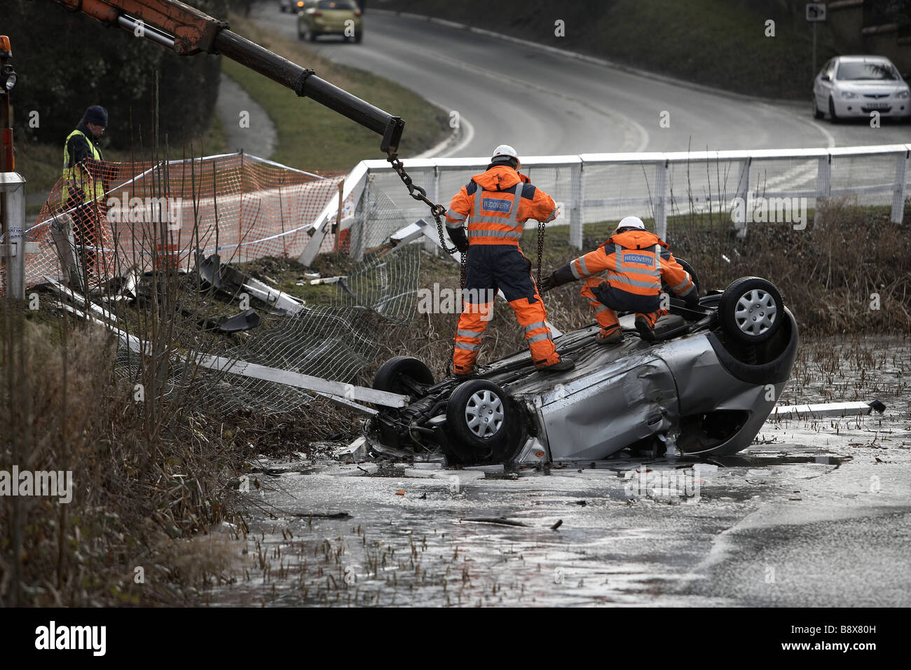 Vehicle recovery car crash from frozen pond Stock Photo Alamy