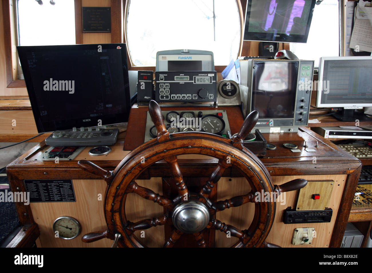 The controls in the wheelhouse of a fishing trawler Stock Photo Alamy