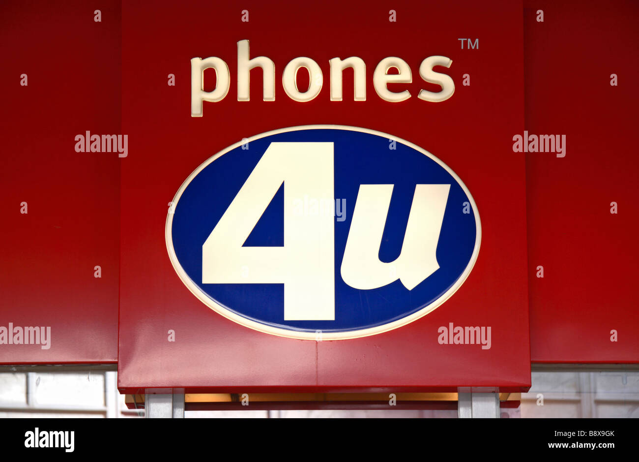 A sign above the Phones 4U mobile phone store in Victoria, London. Mar 2009 Stock Photo