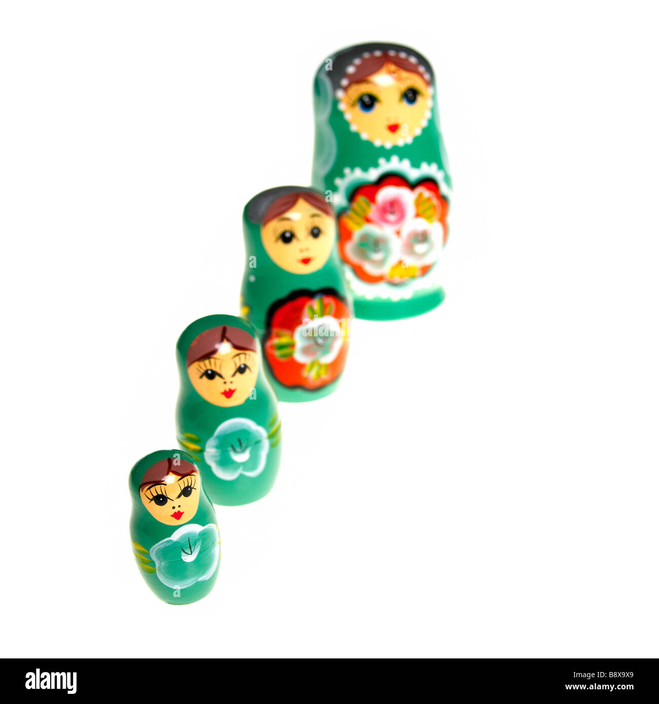 A line of russian dolls on a white background Stock Photo