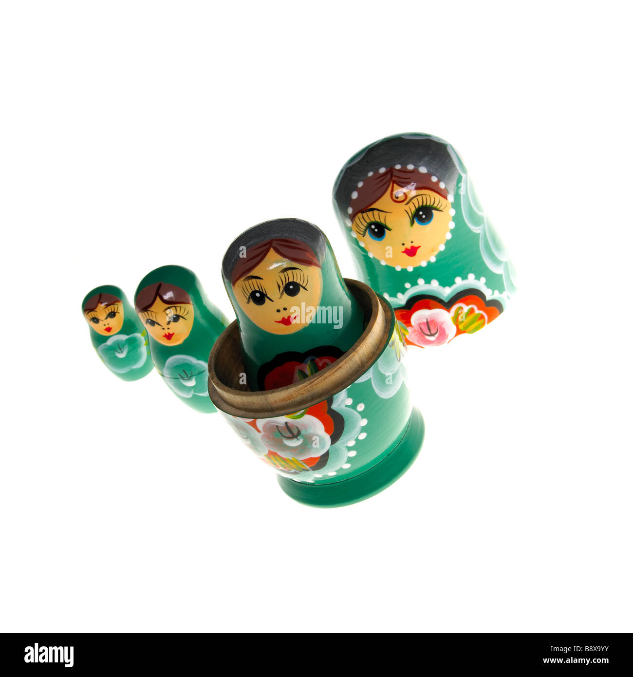 A line of russian dolls on a white background Stock Photo