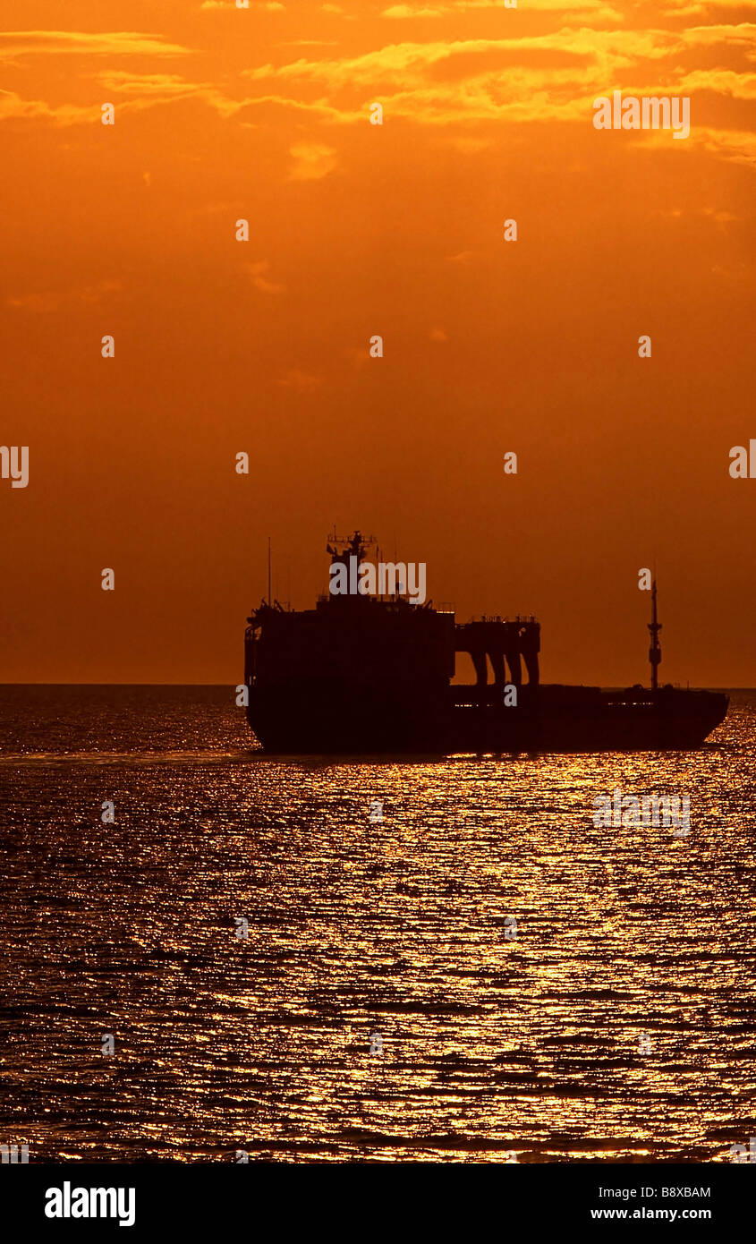 Container ship sea sunset hi-res stock photography and images - Alamy