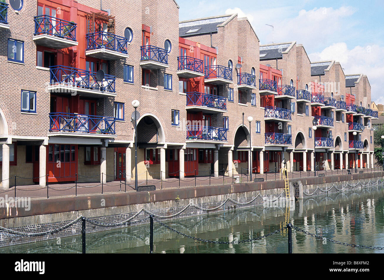 London Docklands, Shadwell Basin with new housing in lieu of former industrial buildings. Stock Photo