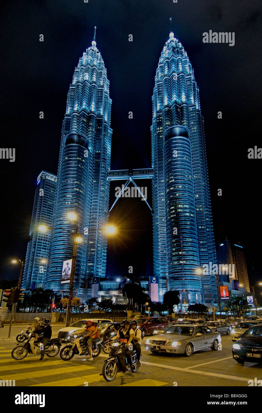 Malaysia Petronas Twin Towers lighted up illuminated at night Kuala Lumpur City Centre KLCC Jalam Ampang Stock Photo