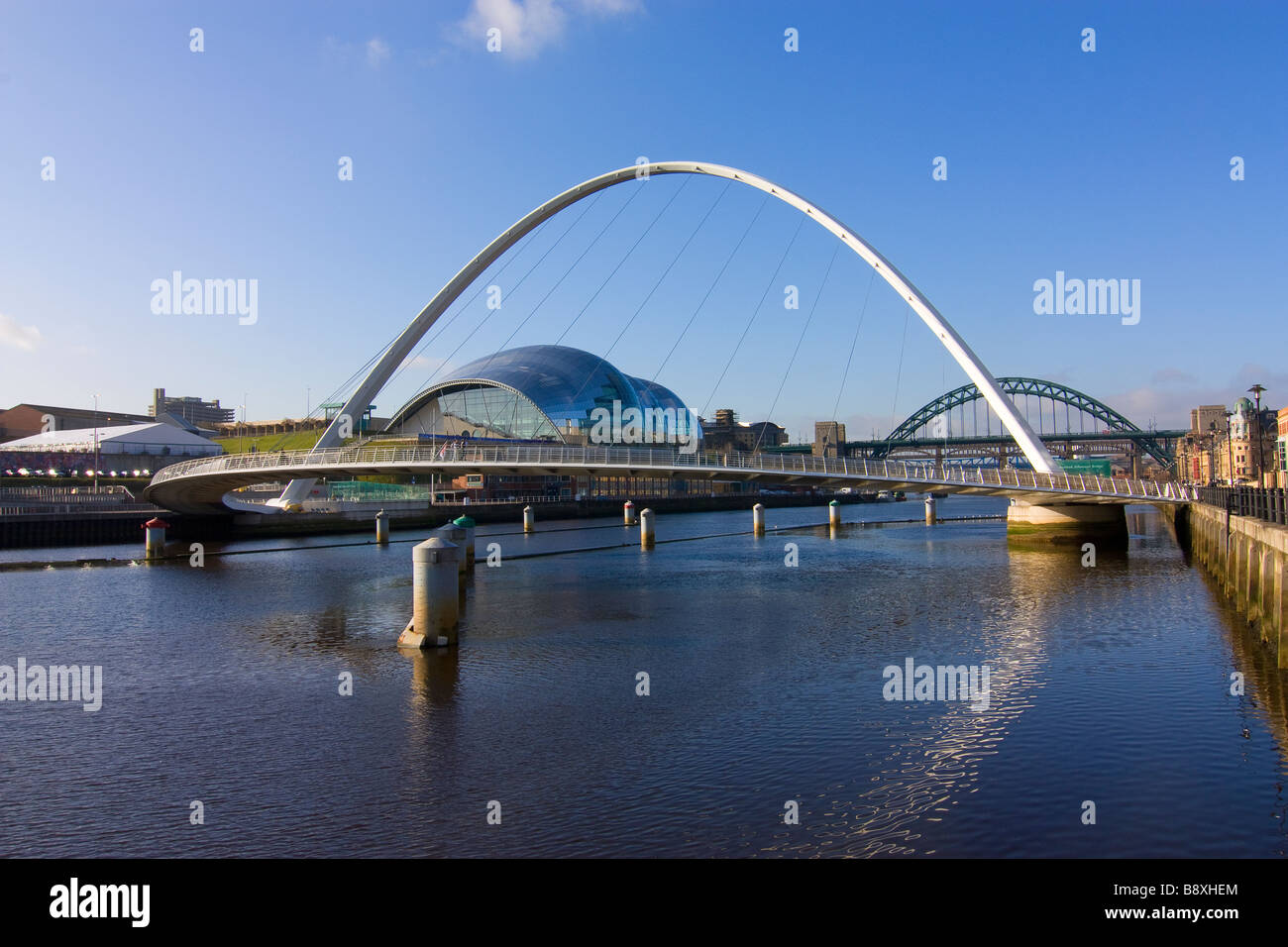 Millennium bridge Newcastle and Gateshead with sage Tyne bridge and Get Carter car park in background Stock Photo