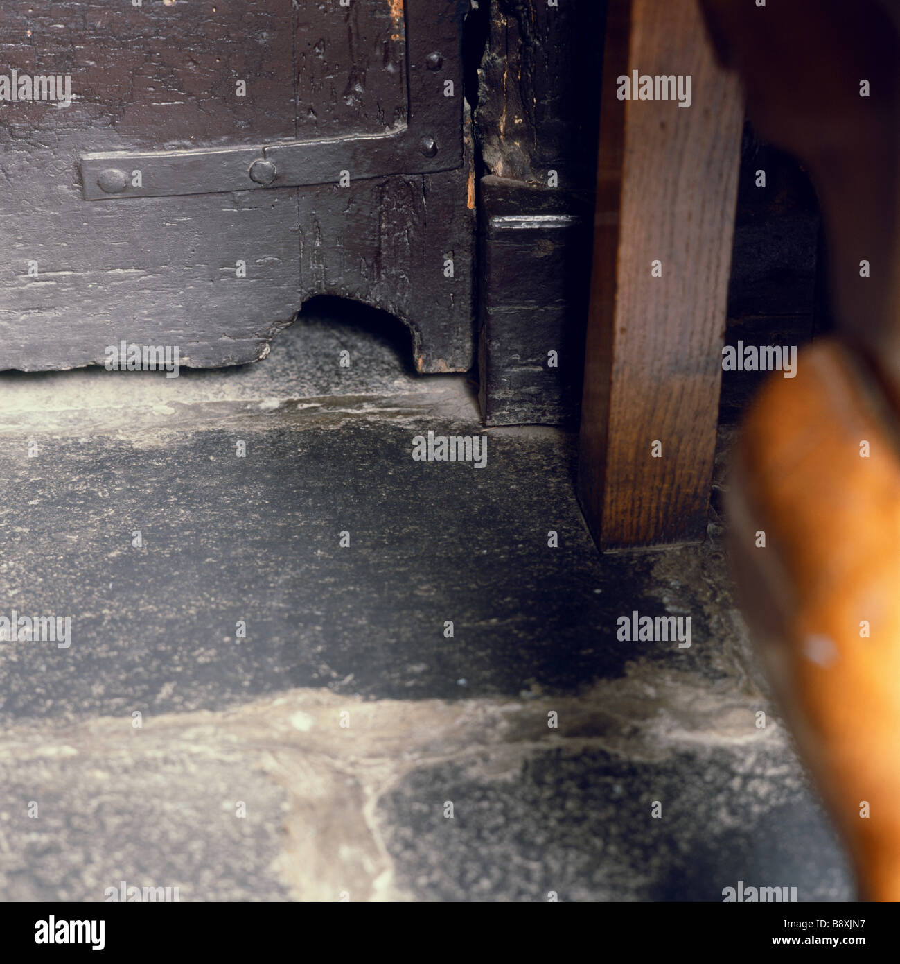 FL Close shot of a mousehole under the door at Hill Top Beatrix Potter s home in Sawrey Cumbria Stock Photo