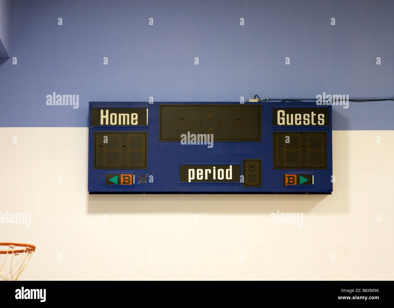 Indoor Sports Scoreboard in Gymnasium Stock Photo