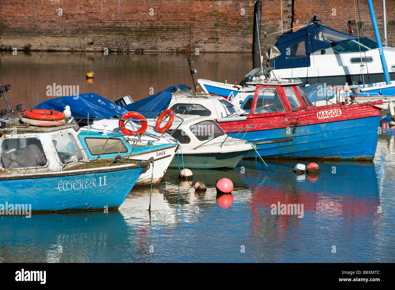 Moored small fishing boats hi-res stock photography and images - Alamy