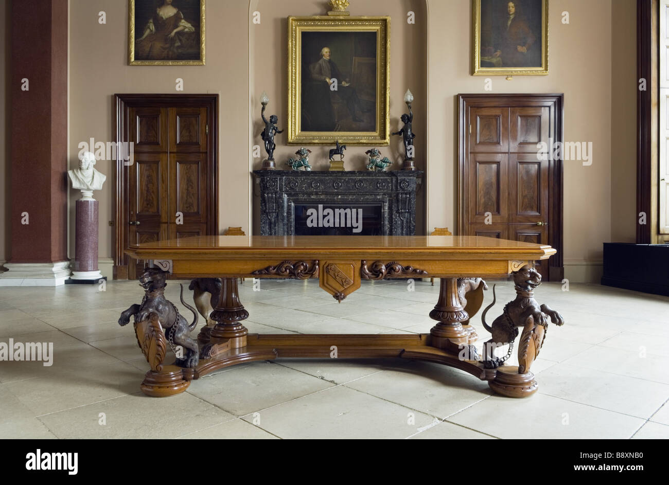 The Entrance Hall at Ickworth Suffolk with the wooden table with carved legs depicting the Hervey snow leopard Stock Photo