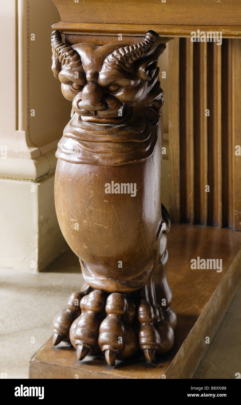 Detail of carved wooden table leg depicting a mythical creature with splayed toes in the Entrance Hall at Ickworth Suffolk Stock Photo