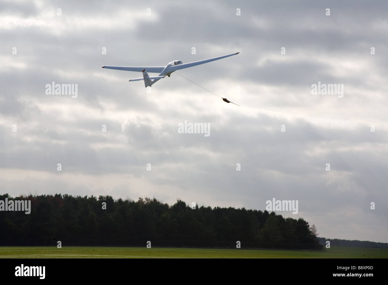 Glider is winched into air at Saltby Airfield Lincolnshire England