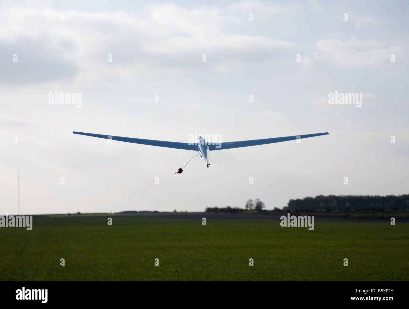 Glider is winched into air at Saltby Airfield Lincolnshire England