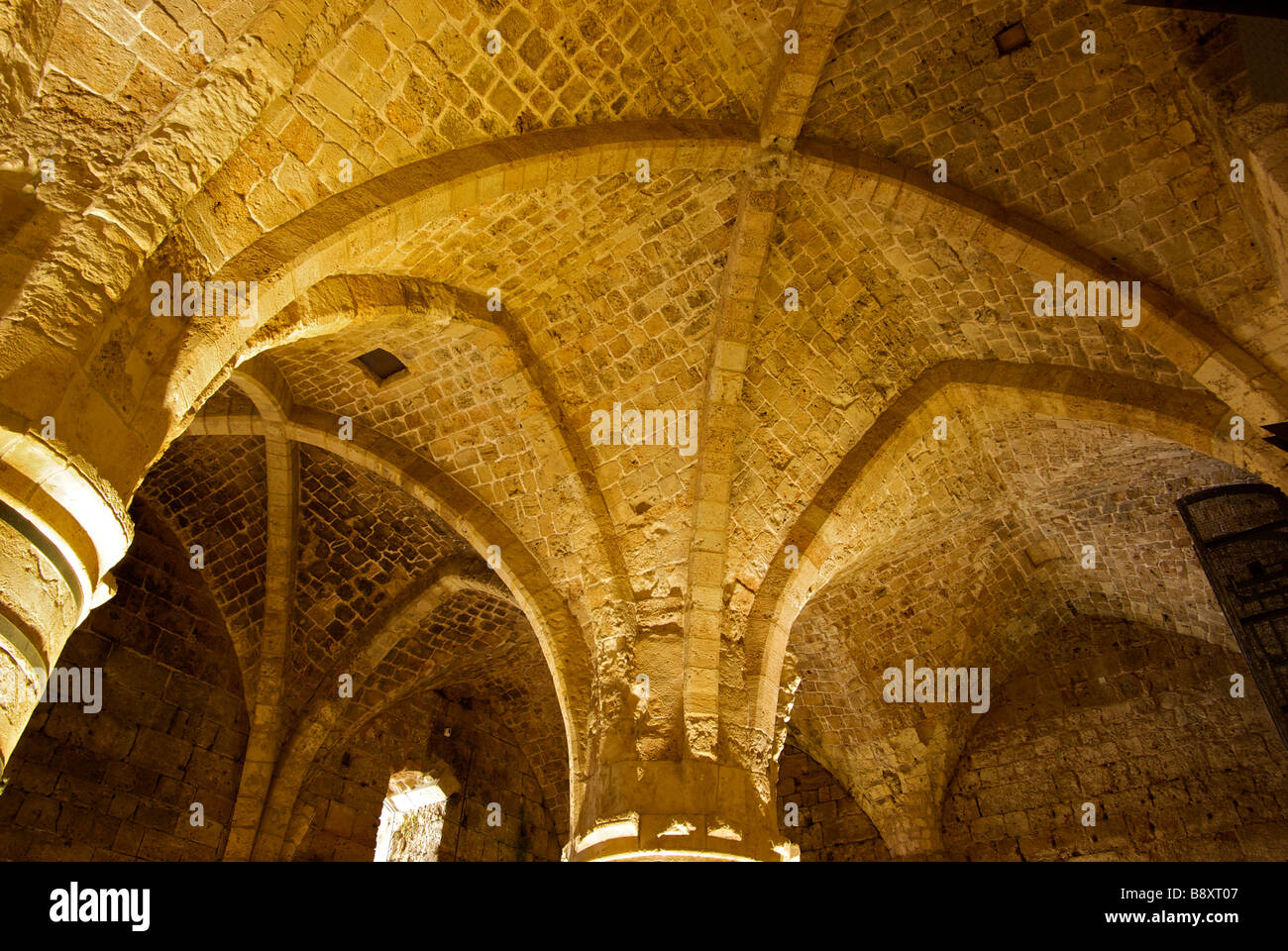 High Gothic arched vaulted ceiling of excavated Templar Knights Halls in the great Refectorium in Acre Stock Photo