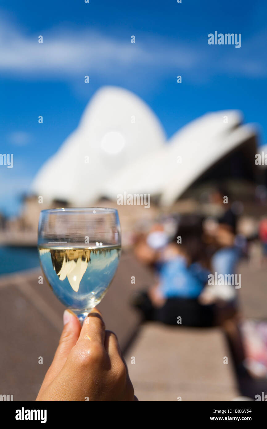 Enjoying a glass of wine at the Opera Bar on Sydney harbour. Sydney, New South Wales, AUSTRALIA