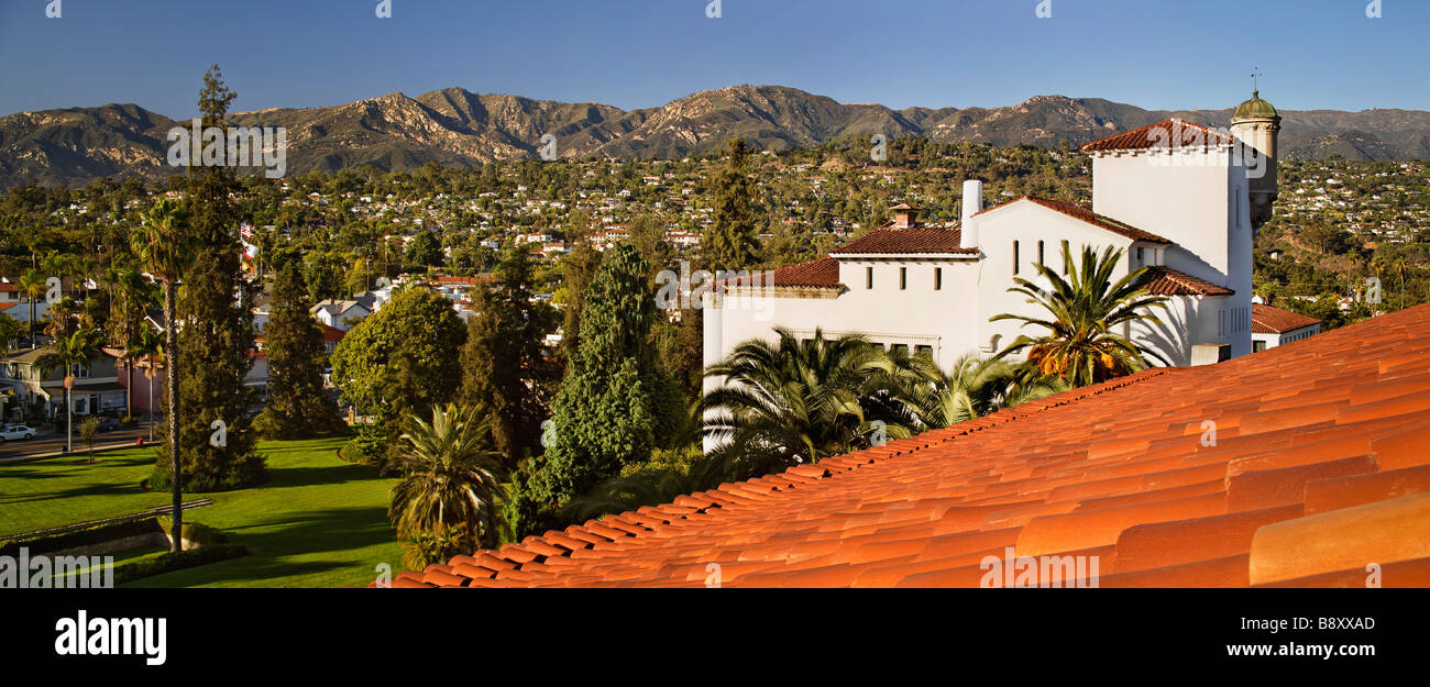 Detail red tile roof and view of houses on mountainside panoramic Stock Photo