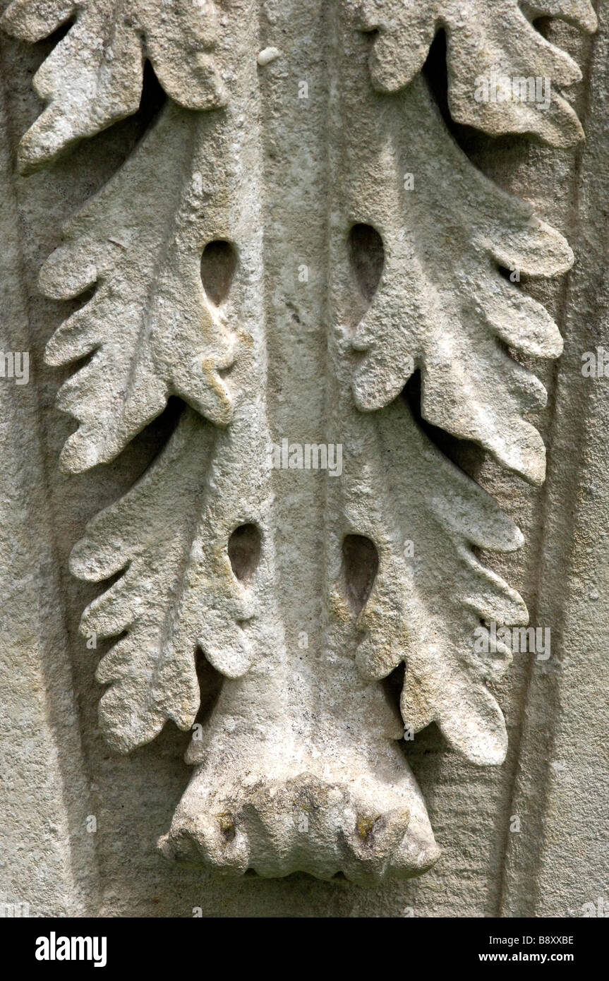 Detail of acanthus leaves carved in stone part of a sculpture in the gardens at Mottisfont Abbey Stock Photo