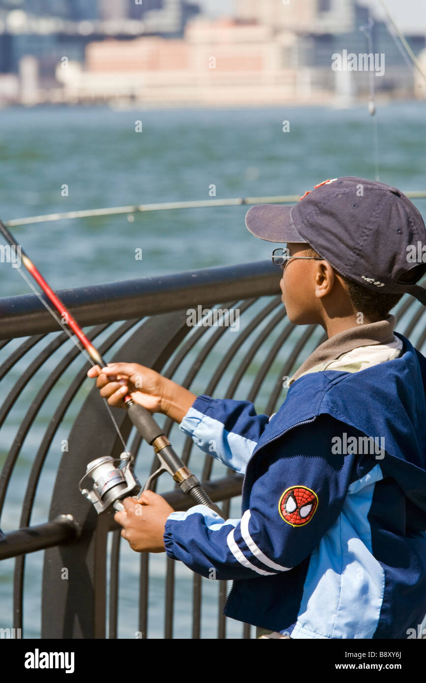 Fishing in the Hudson River from Battery Park Lower Manhattan New York