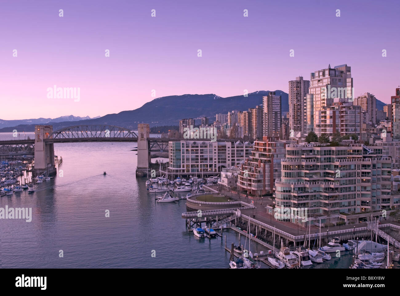 Vancouver, British Columbia skyline at night, mountains in background ...