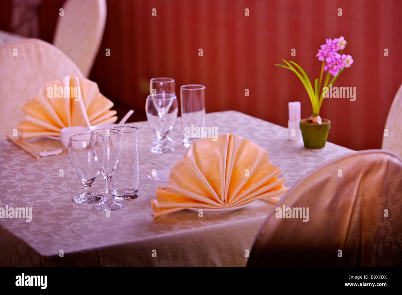 Close up of place settings on the dining table Stock Photo