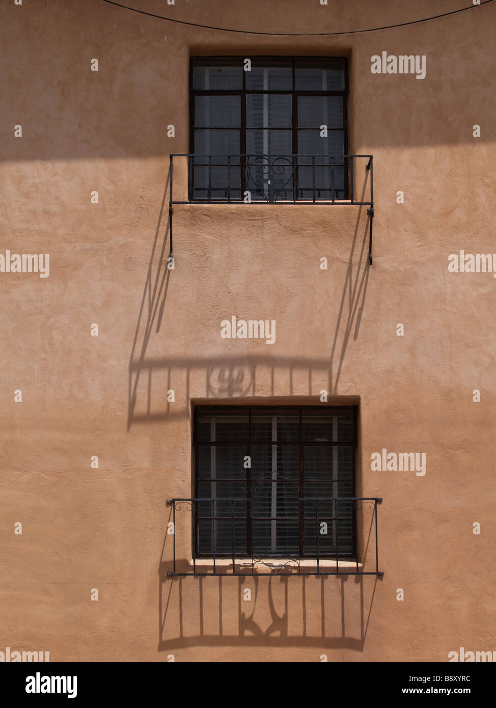 Adobe Building Windows Windows of an adobe building in the Southwest USA Stock Photo - Alamy