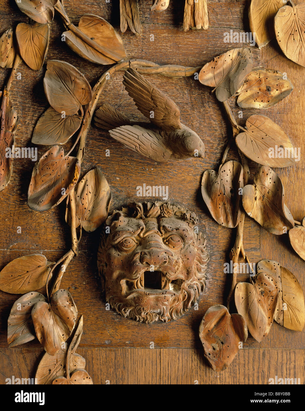 Detail of Grinling Gibbons carving at Petworth House showing the damage that woodworm has caused