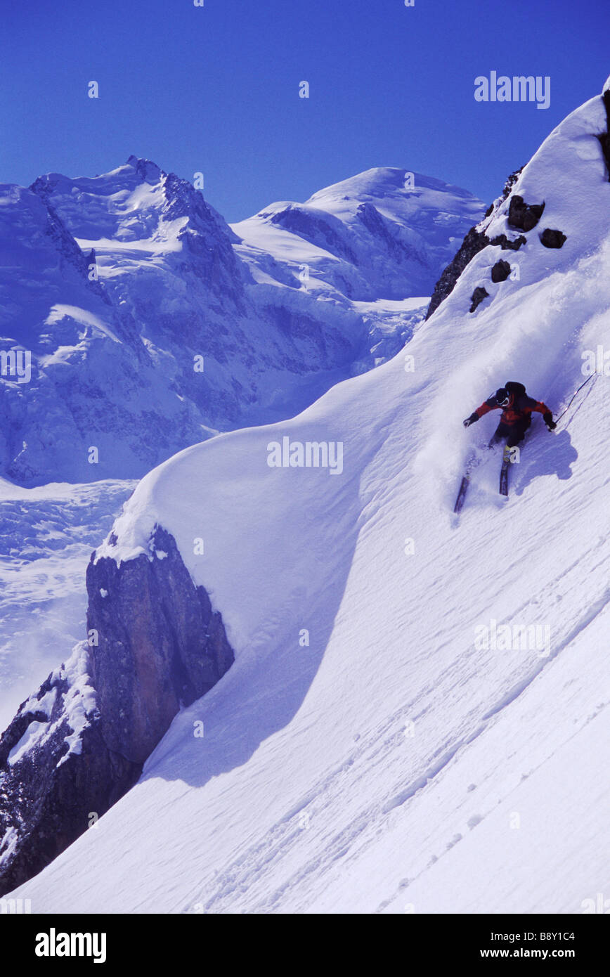 Man skiing on powder snow, Chamonix, Rhone-Alpes, France Stock Photo