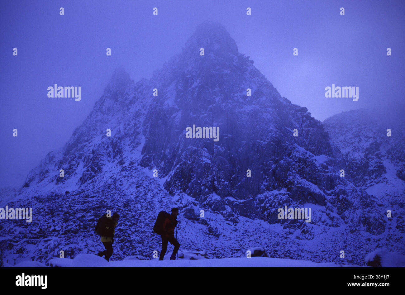 Silhouette of hikers walking in snow, Dusy Basin, Fresno, California, USA Stock Photo