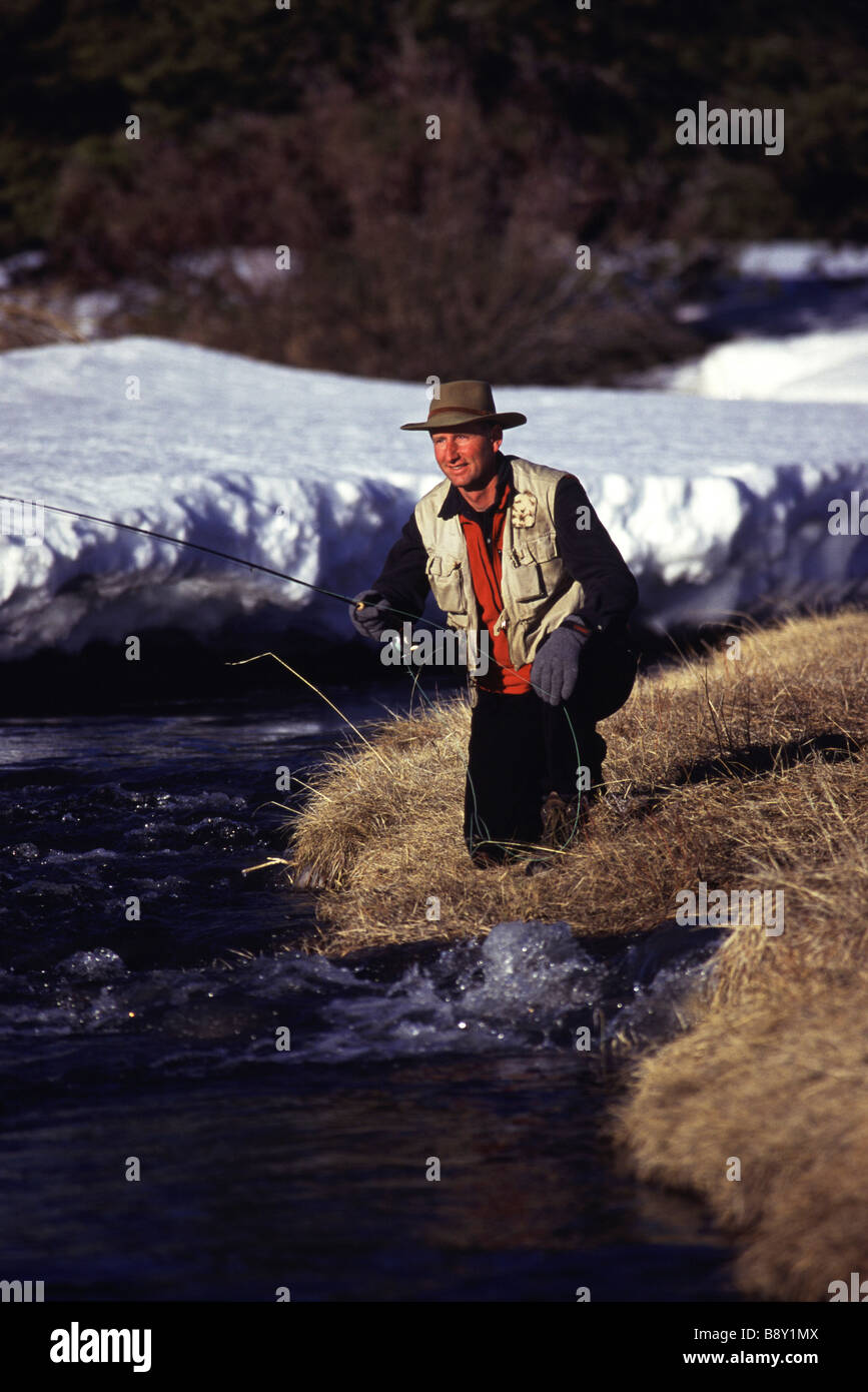 Mid adult man fishing in a creek, Sagehen Creek, California, USA Stock Photo