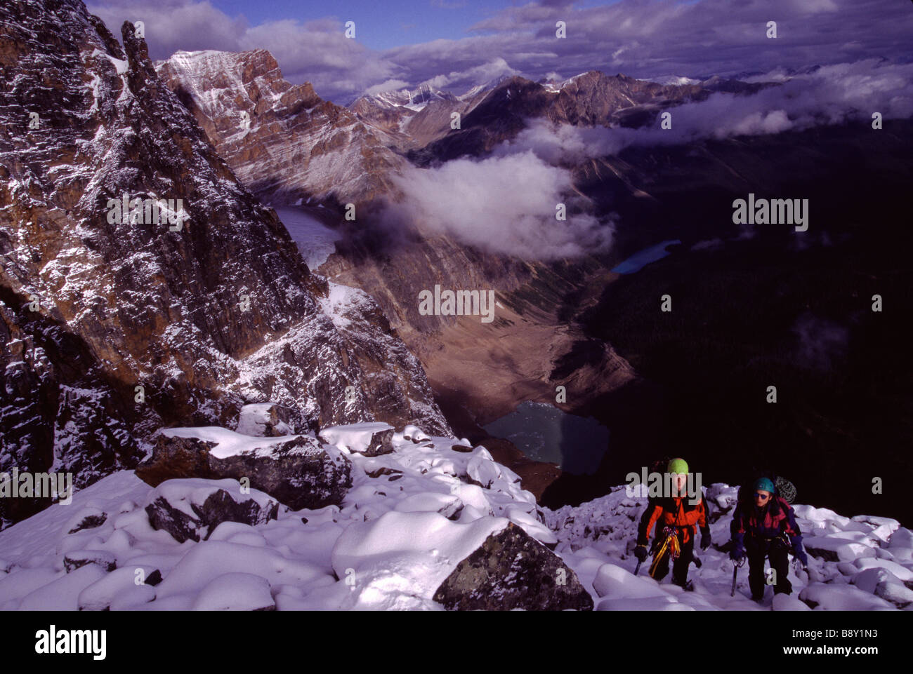 High angle view of two men climbing a mountain, Mt Edith Cavell, Banff ...