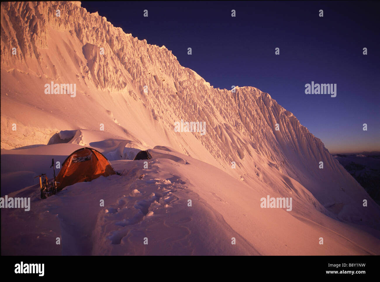 Mountaineers camping on a snow covered mountain, Camp 2, Manaslu, Mansiri Himal, Nepal Stock Photo