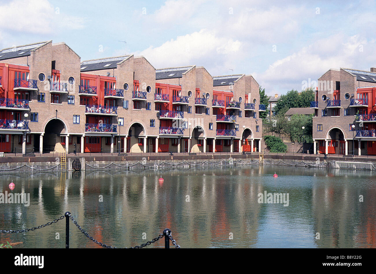 London Docklands, Shadwell Basin with new housing in lieu of former industrial buildings. Stock Photo