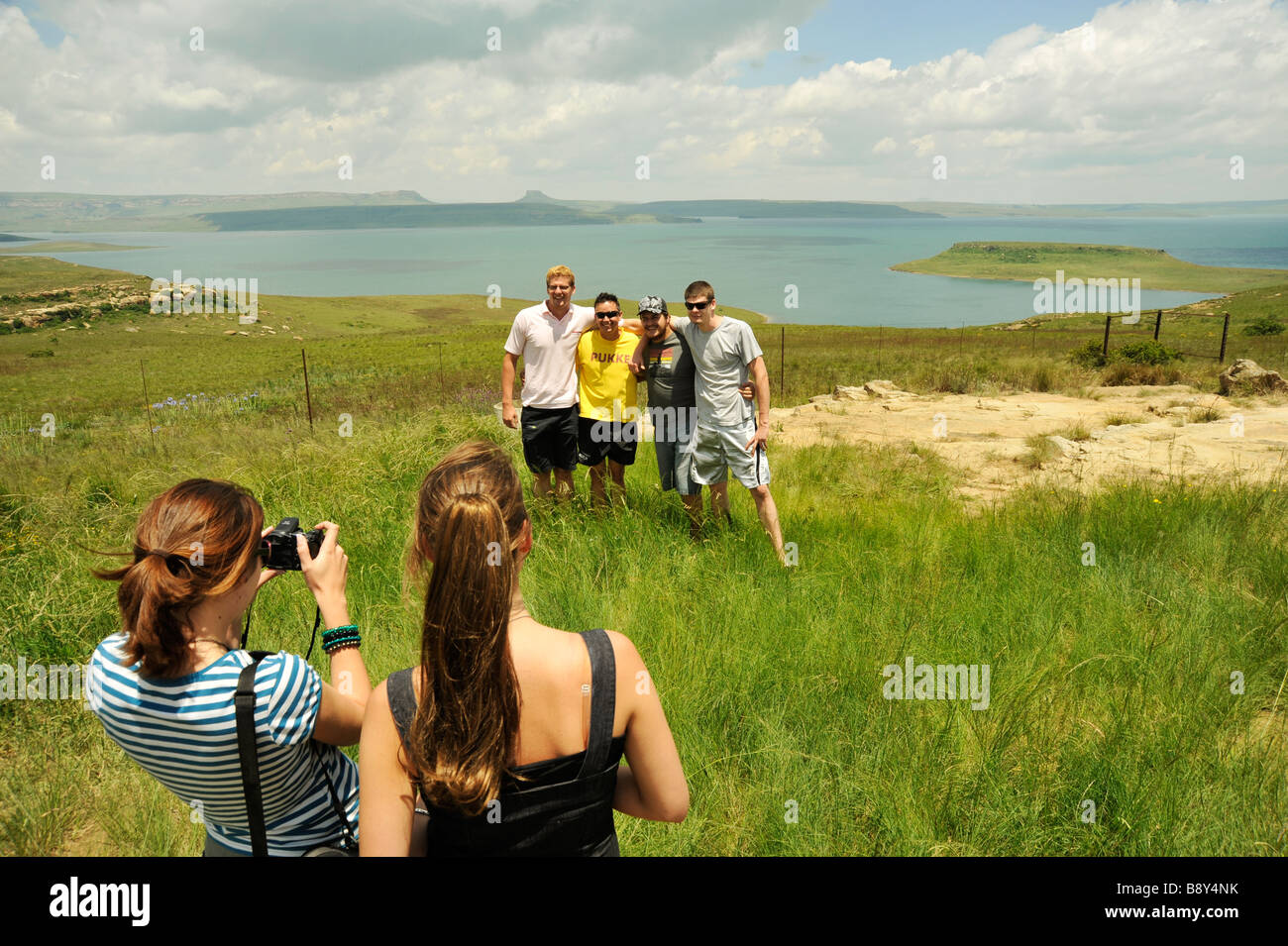 Berville, KwaZulu-Natal, South Africa, landscape, people, unknown group of young adult men posing for holiday photograph, Sterkfontein dam, candid Stock Photo