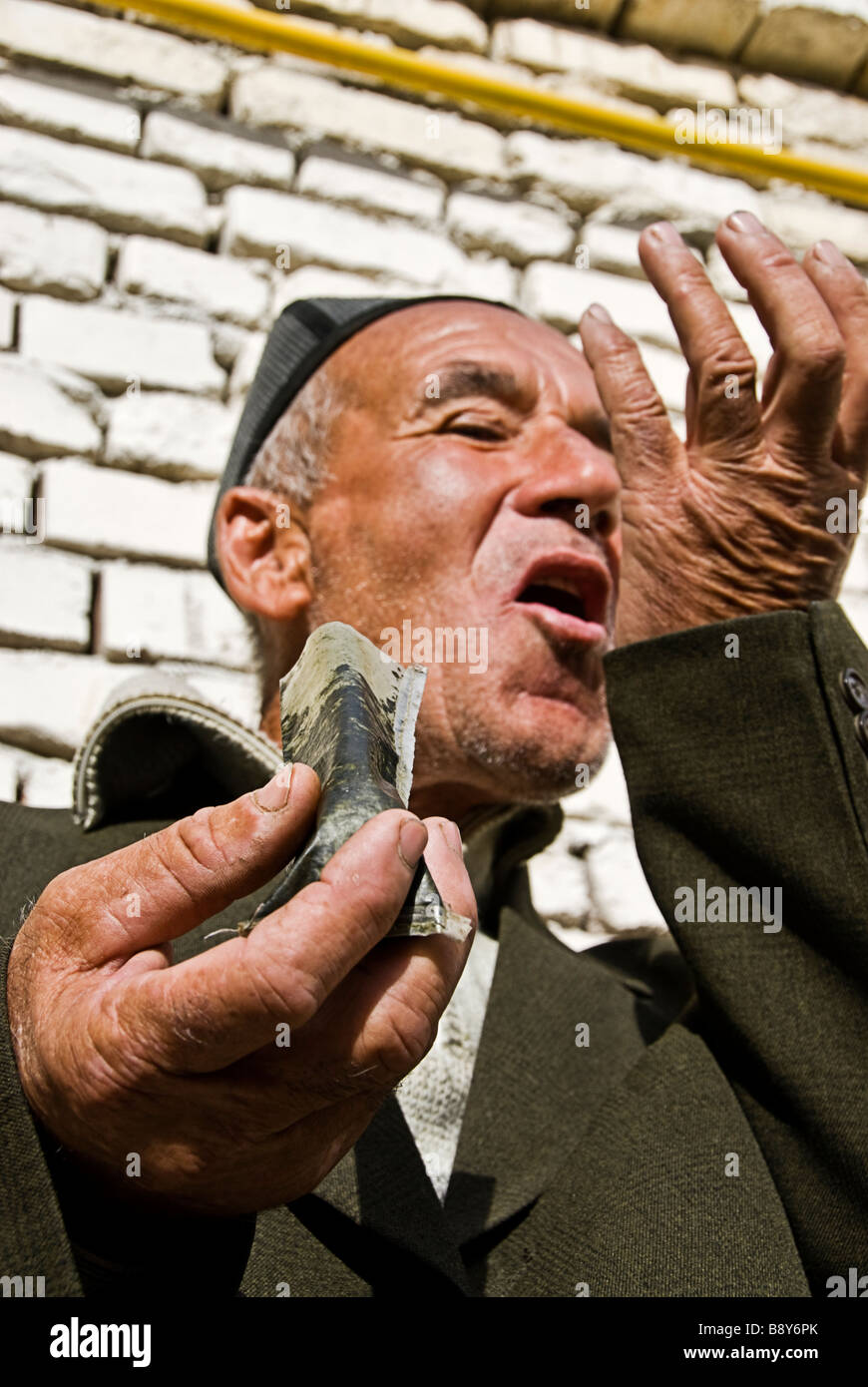 Uzbek man chewing tobacco, Tashkent, Uzbekistan, Asia Stock Photo